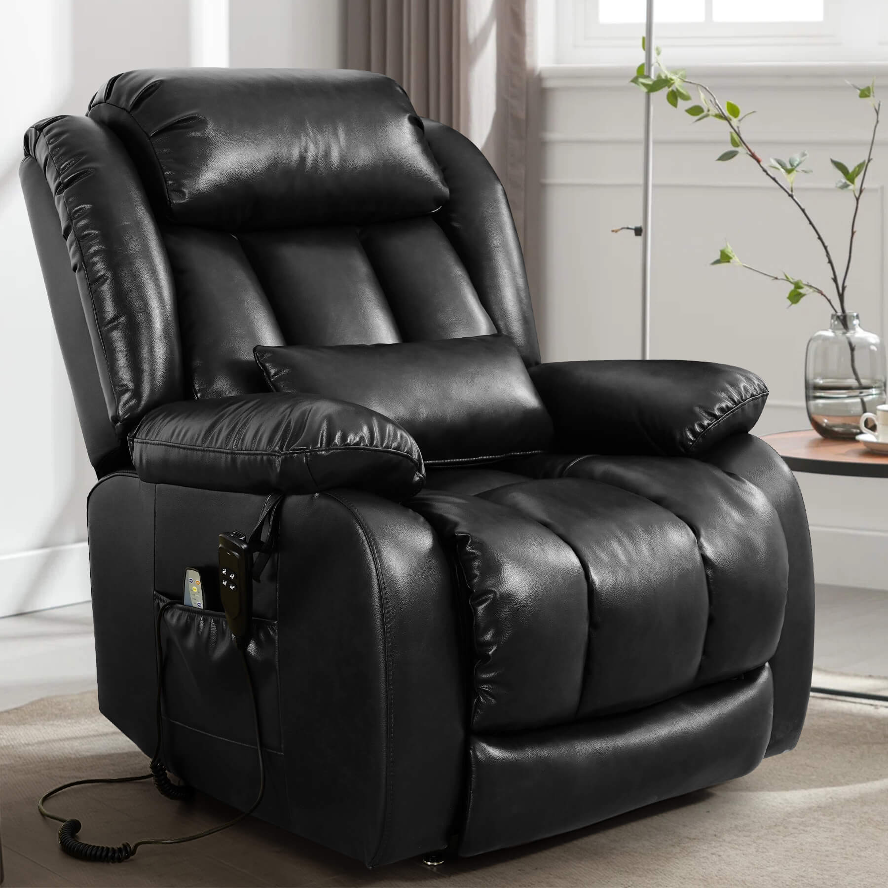 Black blue leather recliner chair in a living room setting, facing sideways.