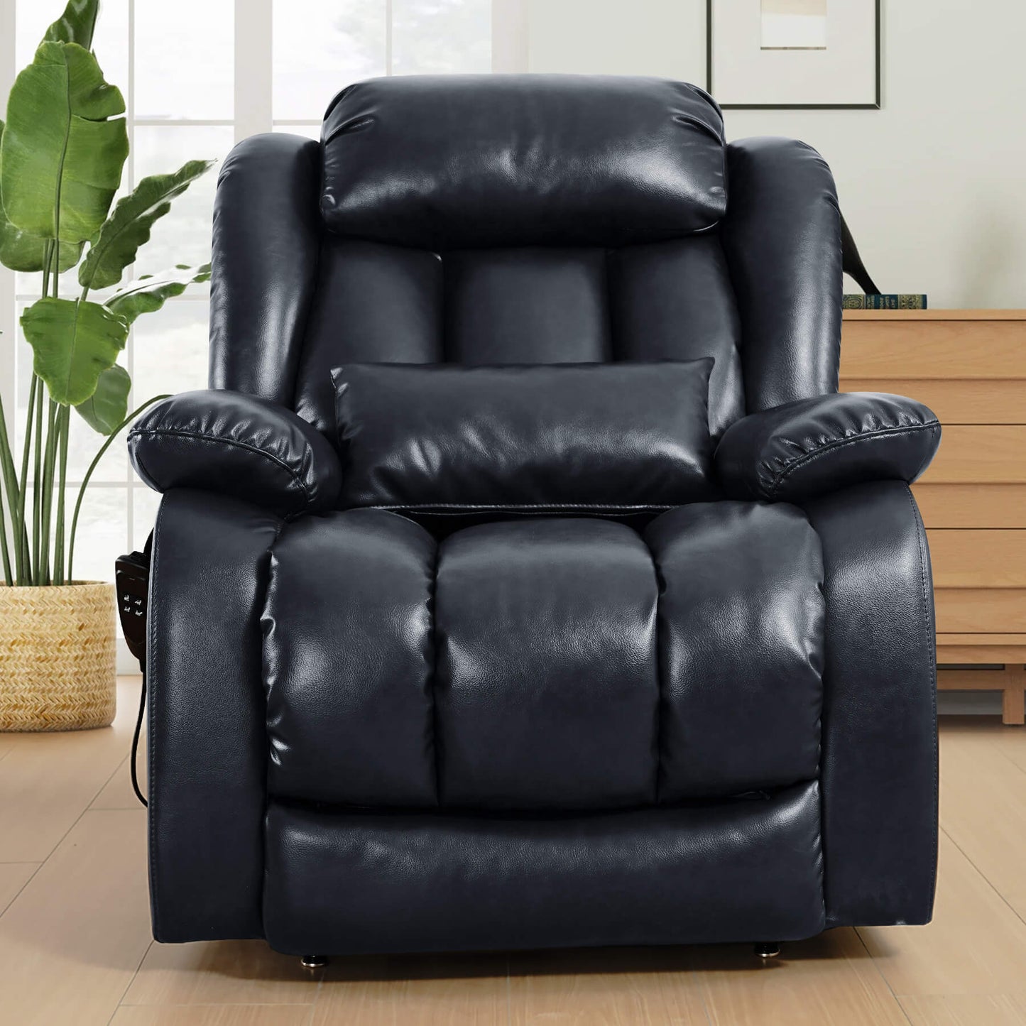 Navy leather recliner chair in a living room setting, facing forward.
